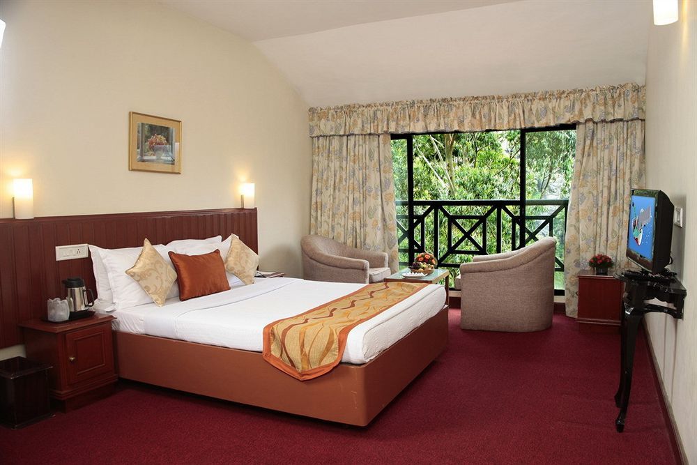 Abad Copper Castle Resort Муннар Экстерьер фото