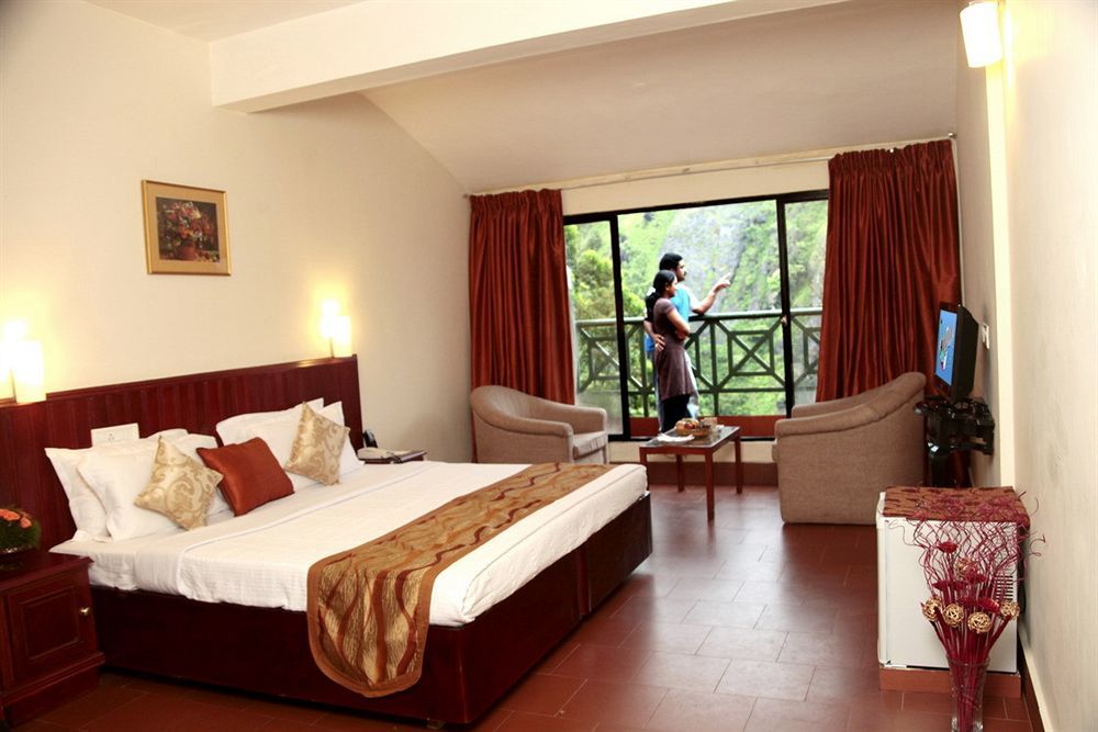 Abad Copper Castle Resort Муннар Экстерьер фото